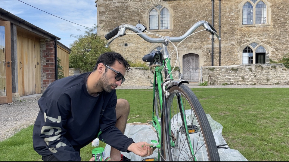Raman paints his bicycle green
